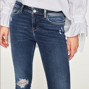 Zara mid-rise distressed jeans with shiny trim